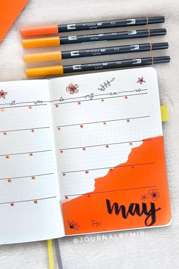 cute monthly spread with oragne