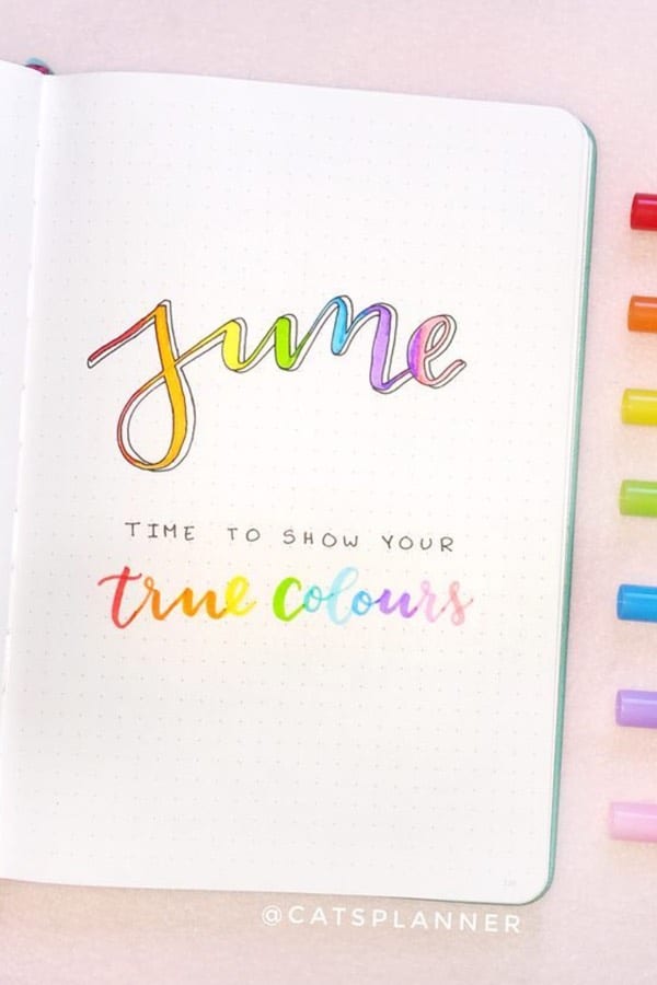 june cover spread with rainbow
