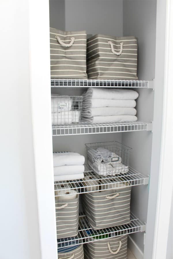 cottage linen closet organization