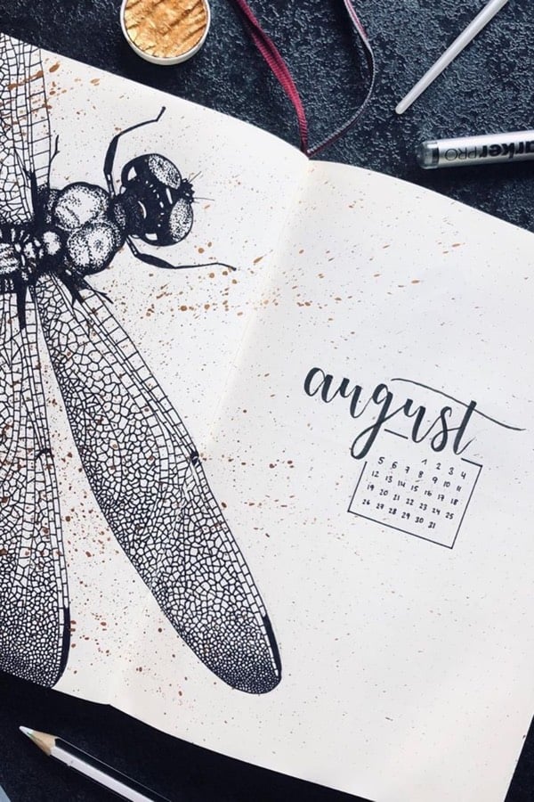 black and gold monthly cover for aug