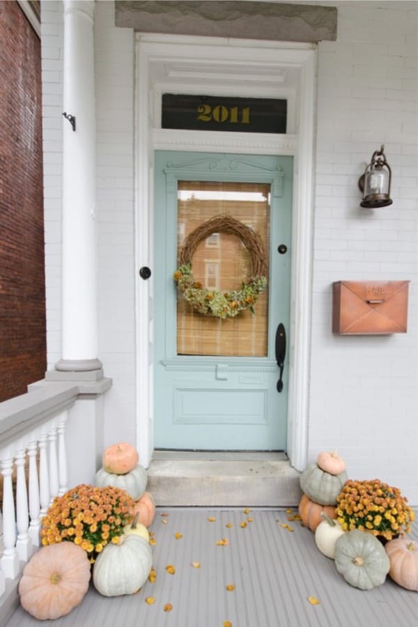 fall porch with blue door