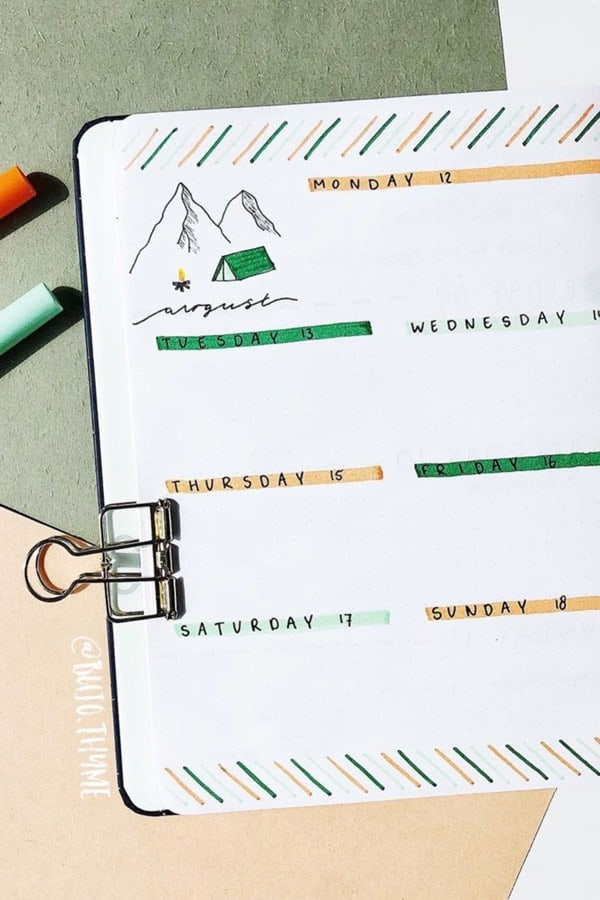 bujo weekly log with camping theme