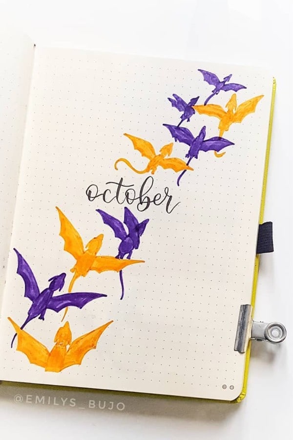bujo monthly cover with dragon doodles