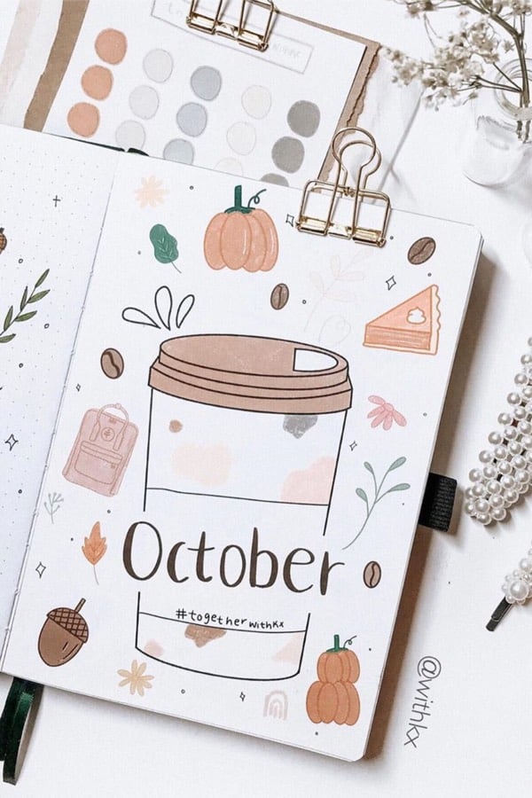 bullet journal cover spread with coffee