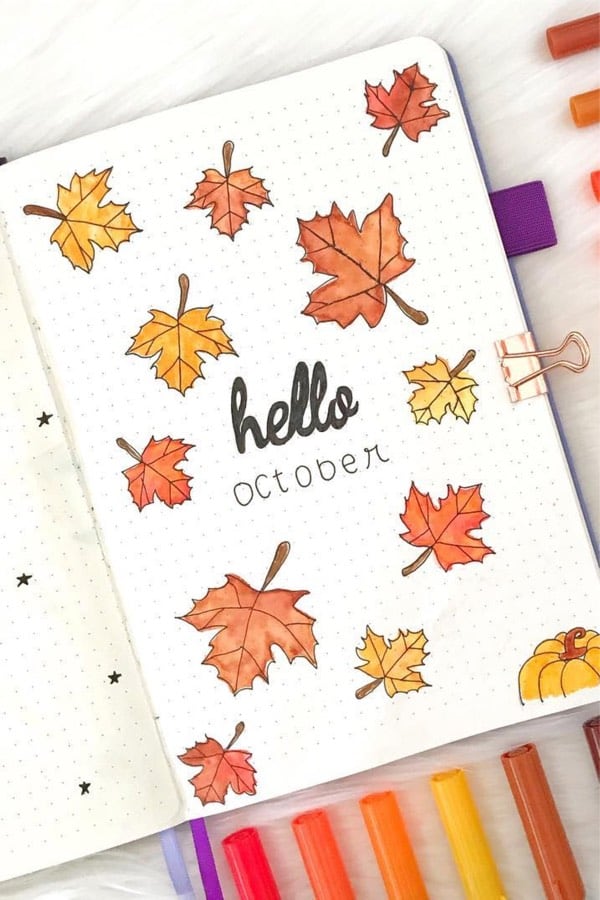 bujo cover spread with fall leaves in orange