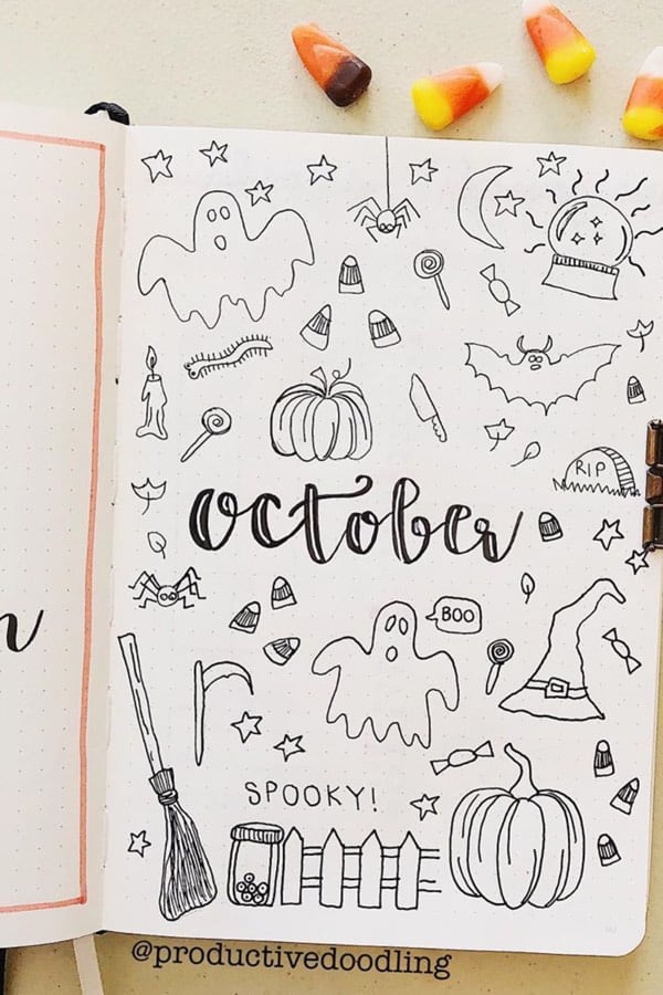 bullet journal monthly cover with halloween doodles