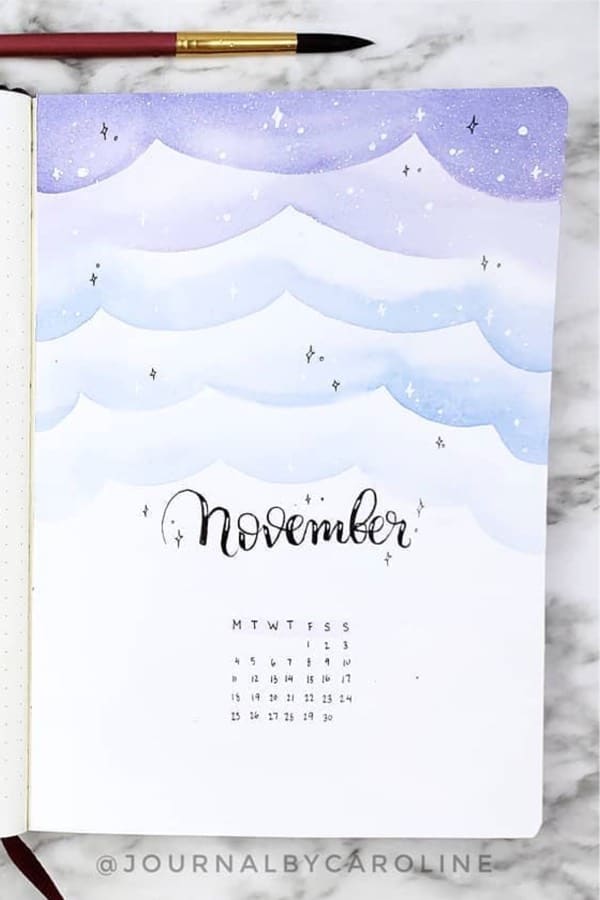 bullet journal monthly cover with clouds