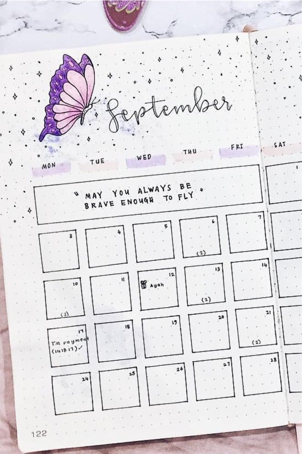monthly spread with butterfly doodles