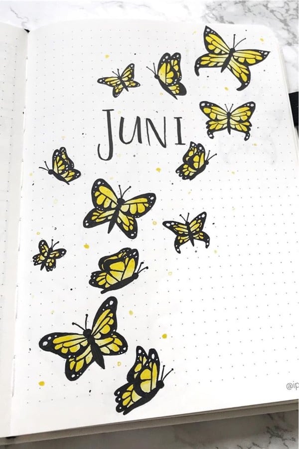 bujo cover page with yellow butterfly