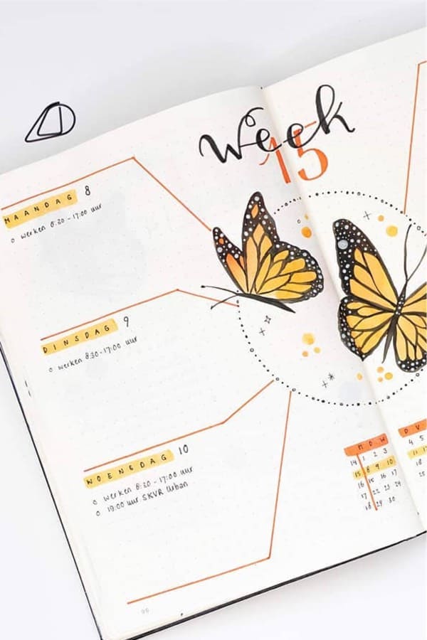 bullet journal layout with orange butterflies