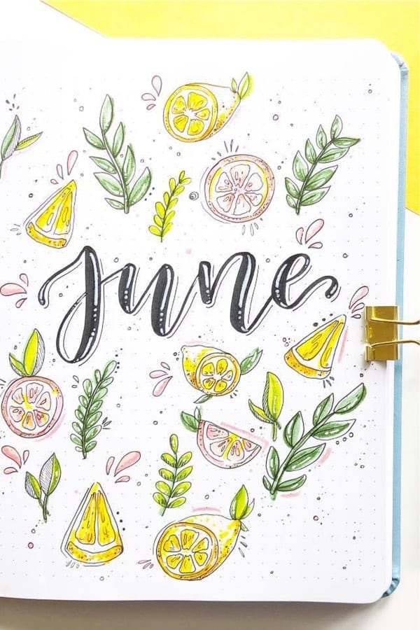bullet journal cover spread with yellow