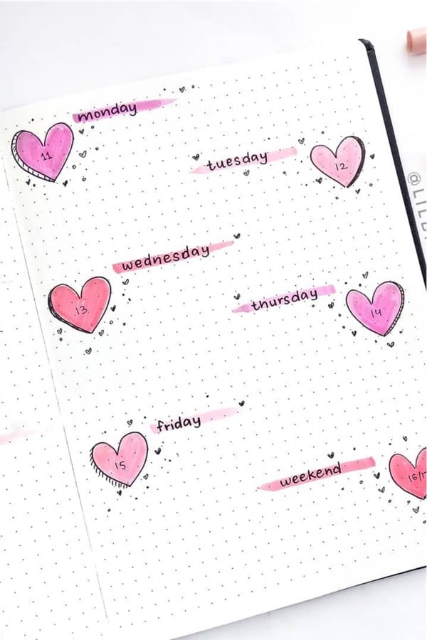 bullet journal spread with heart theme