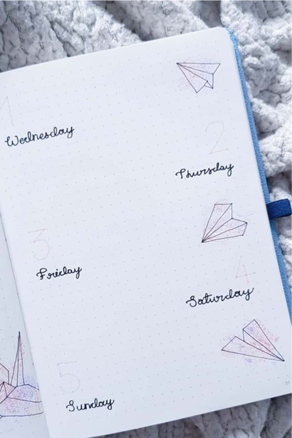 weekly layout with paper plane theme