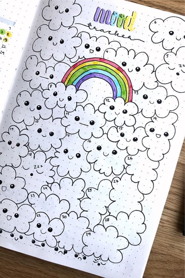bujo tracker with rainbow doodles