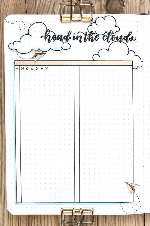 bujo tracker with cloud and plane decoration
