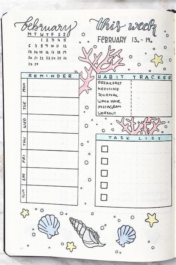 bullet journal spread with coral doodles