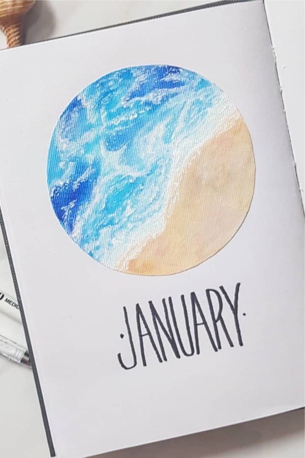 bullet journal cover with beach sand drawing