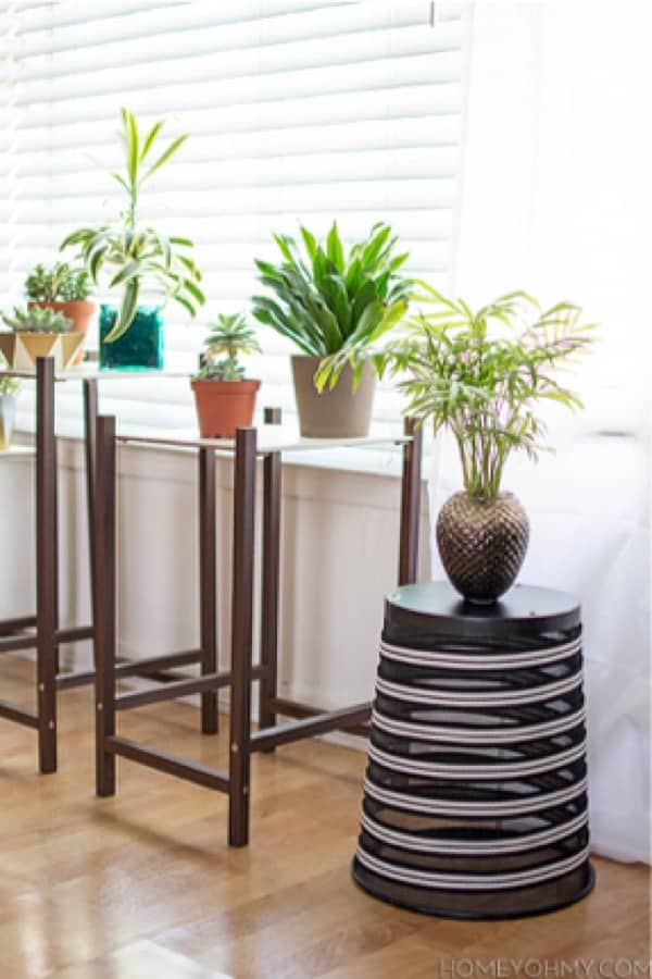 upcycled trash can planter stand