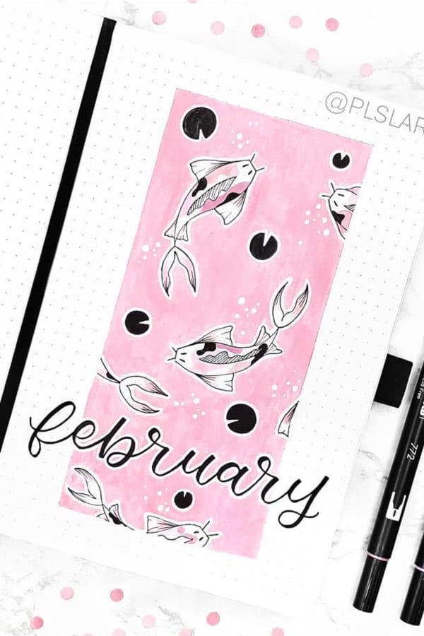 bullet journal cover with pink koi fish doodles