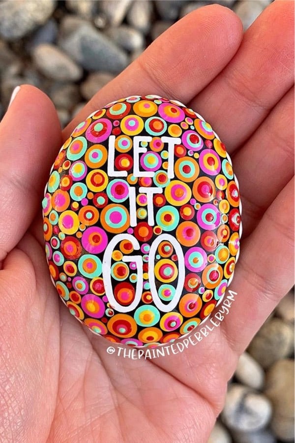 dot painted pebble with quote
