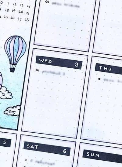 grid journal spreads with hot air balloon doodles