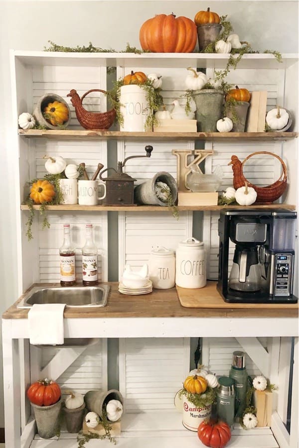 coffee cabinet with fall decor