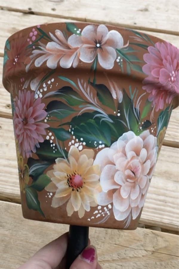 clay pot with painted flowers