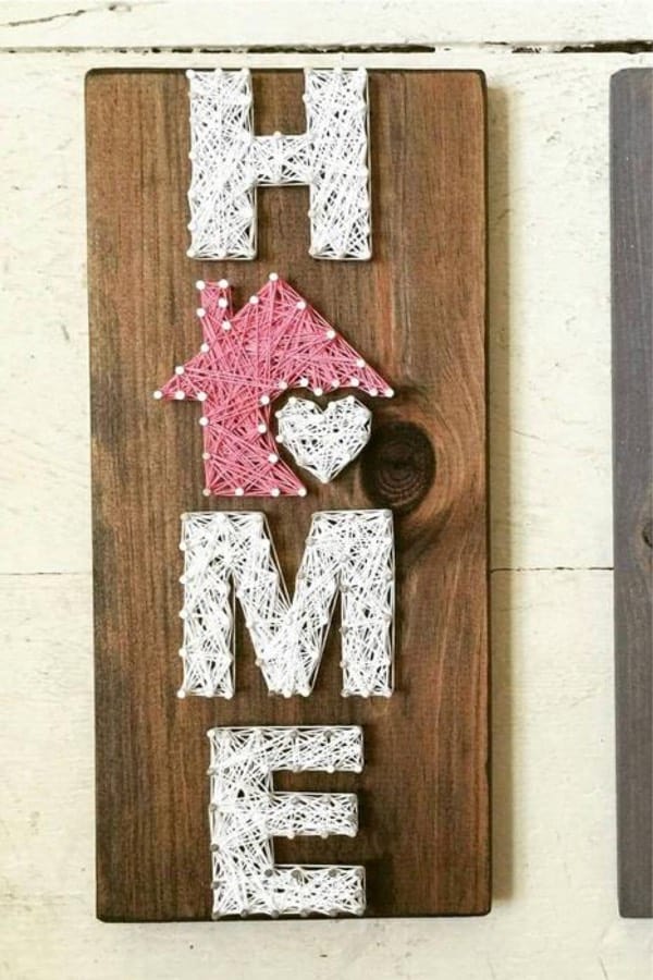 nail and string home decor sign