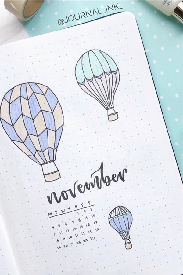 monthly cover page with flying balloon theme