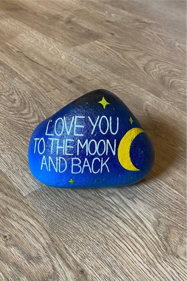 love you to the moon and back painted pebble