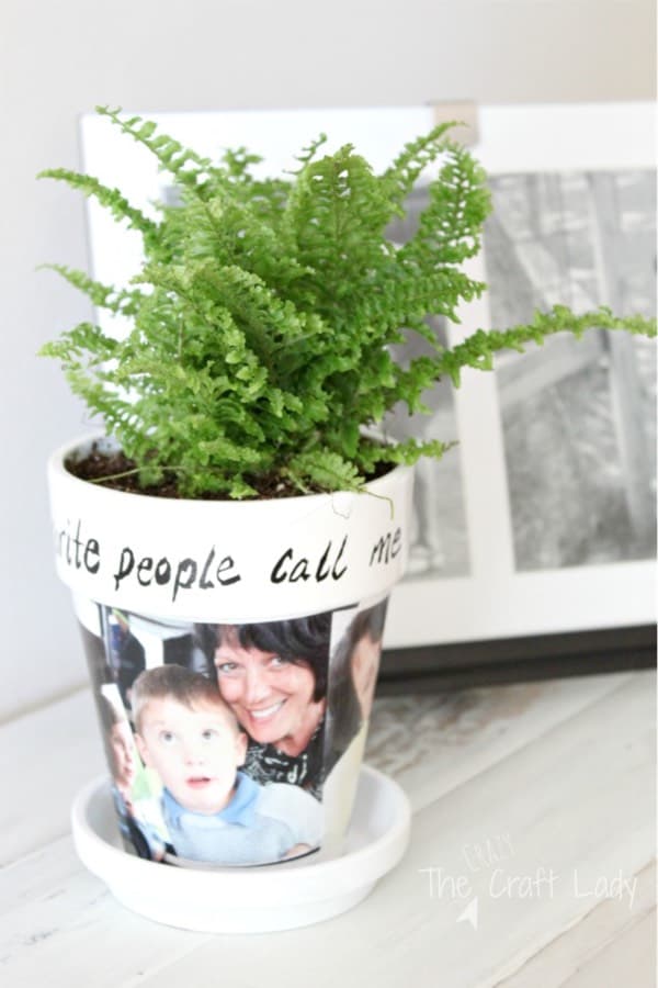 decorated clay pot with photos