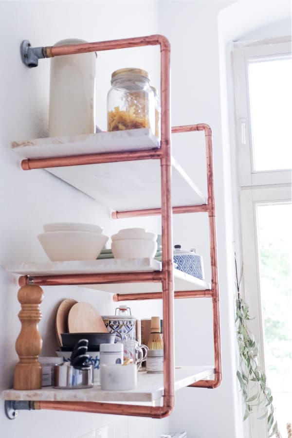 shelving inspiration with copper pipes