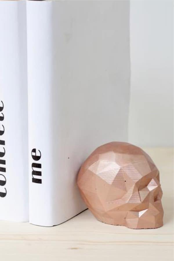 skull bookend made from concrete