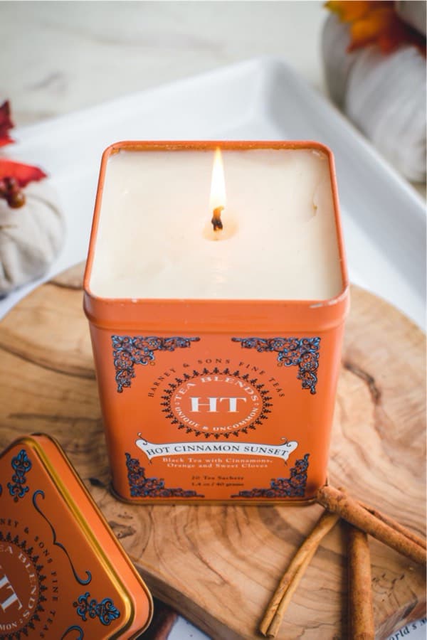 recycled tea tin into candle