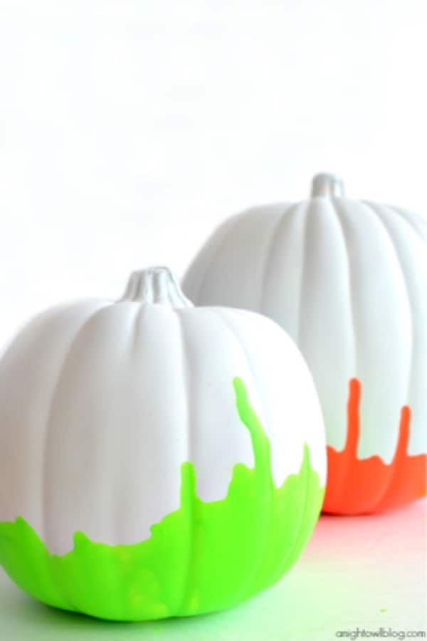 dipped paint on white pumpkins
