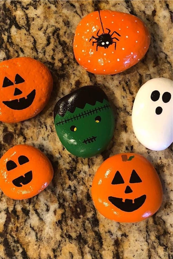 easy rock painting with pumpkins