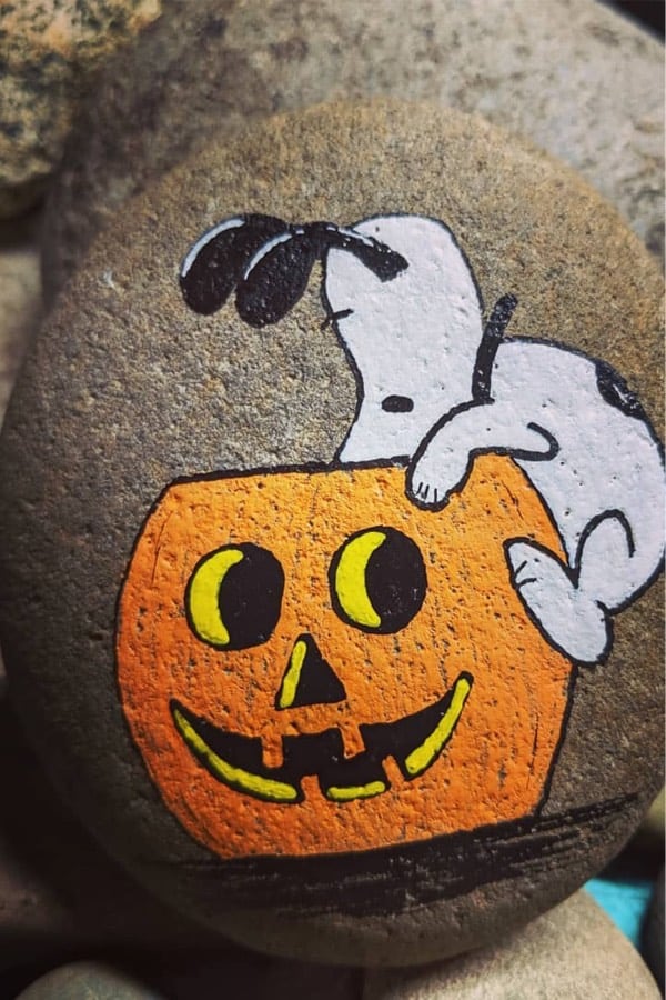 painted rock inspiration with snoopy