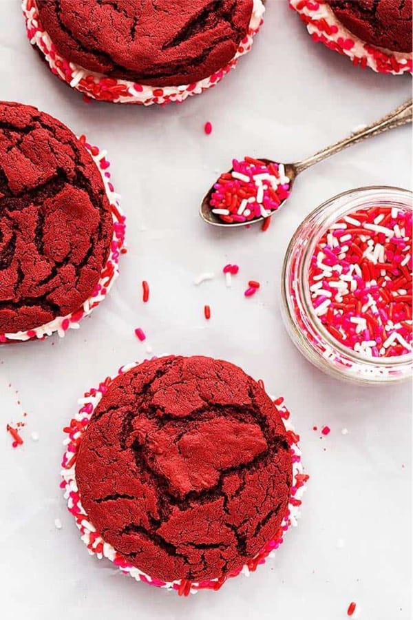 red velvet cookie sandwich with sprinkles