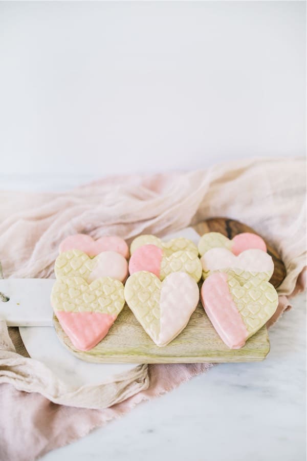 pink chocolate dipped heart shaped cookies