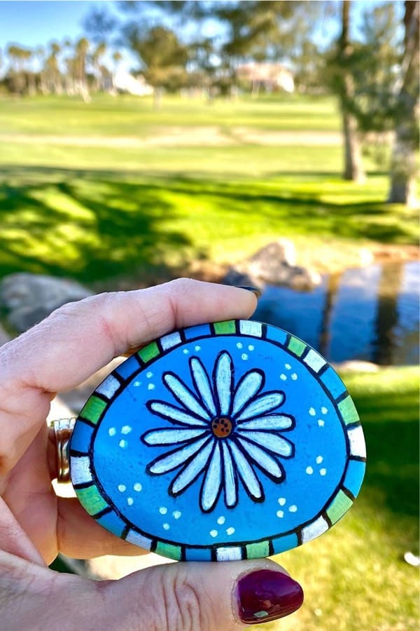 kindness rock with summer daisy painting