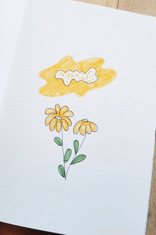 bujo cover spread with yellow flowers