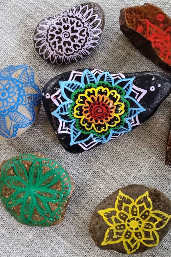 rock painting example with geometric flowers