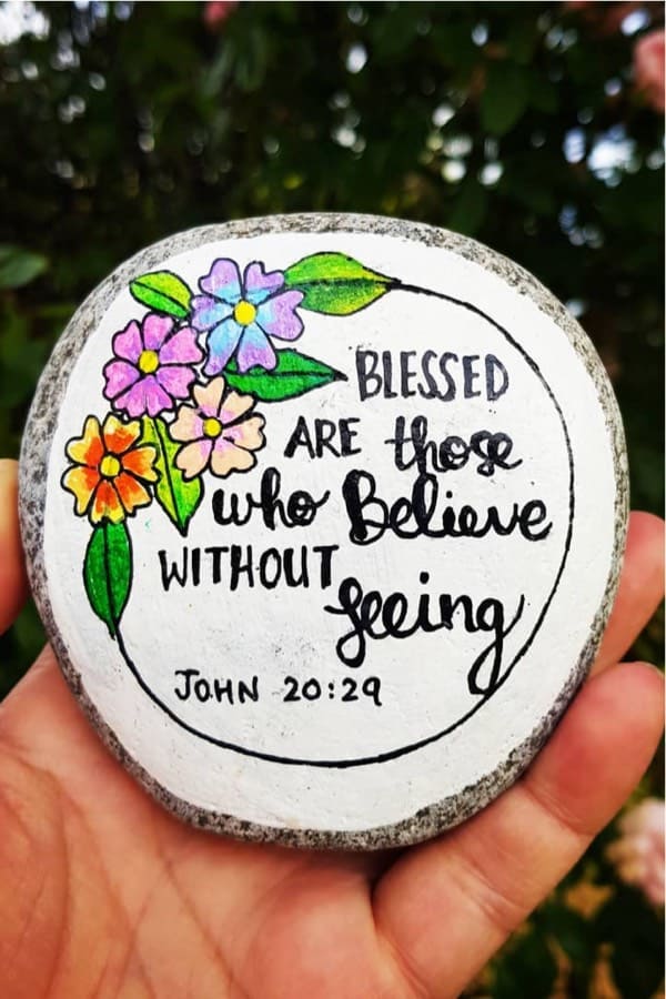 bible verse painted rock with flowers