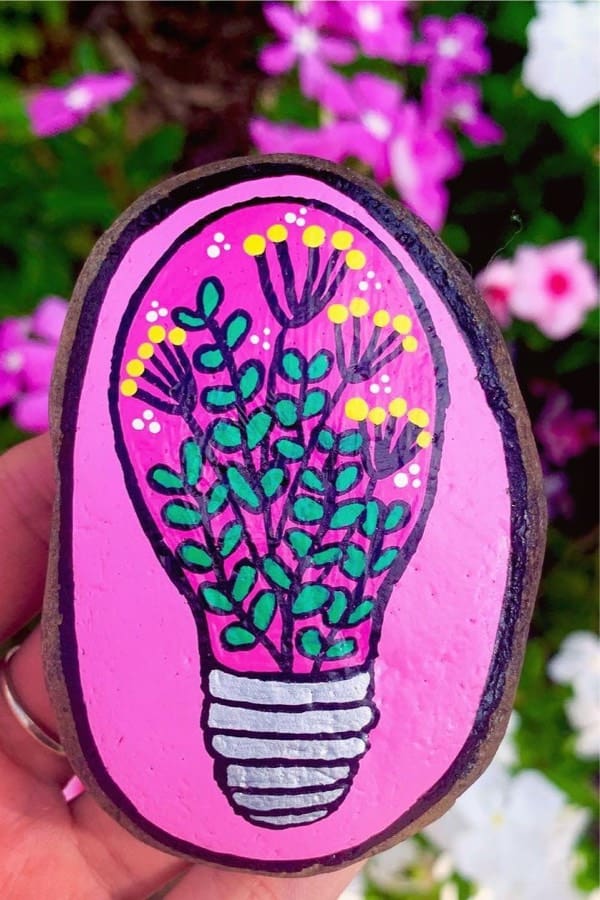 rock painting design with pink flowers