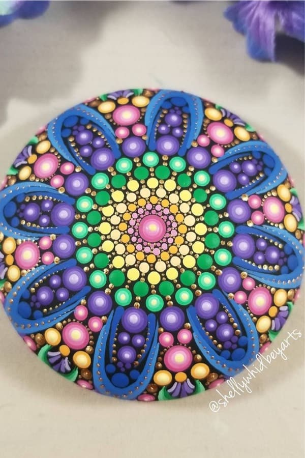 rock painting inspiration with flower theme