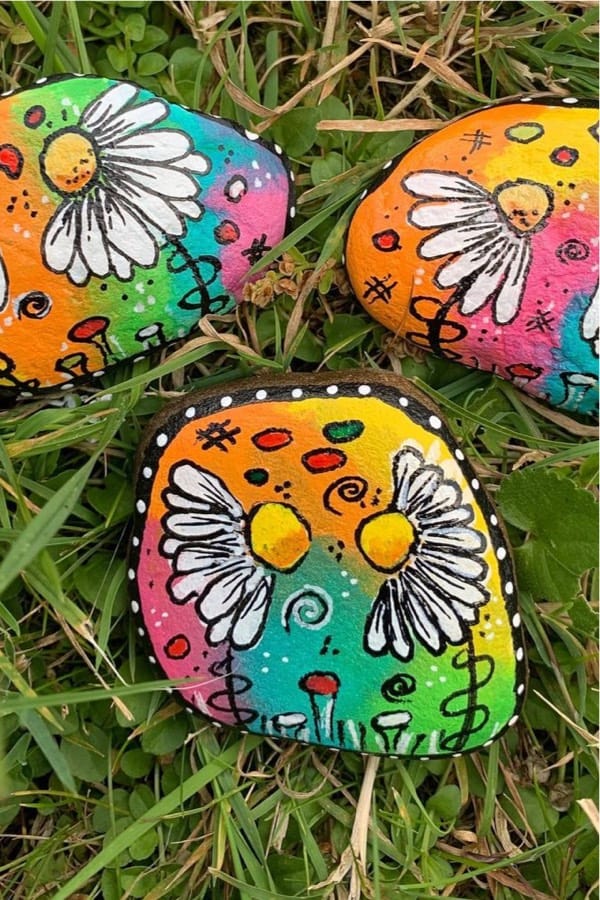 daisy themed painted kindness rock example