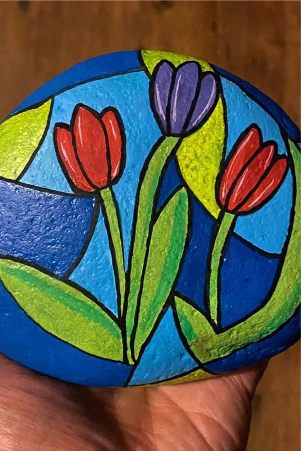 hand painted stone with tulip design