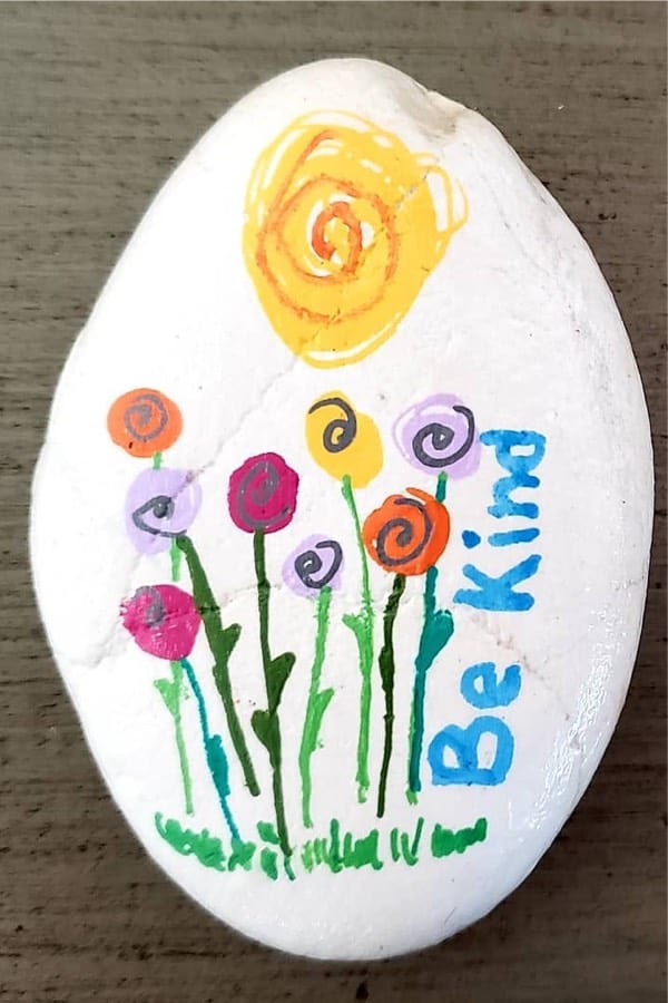 easy rock painting with colored flowers
