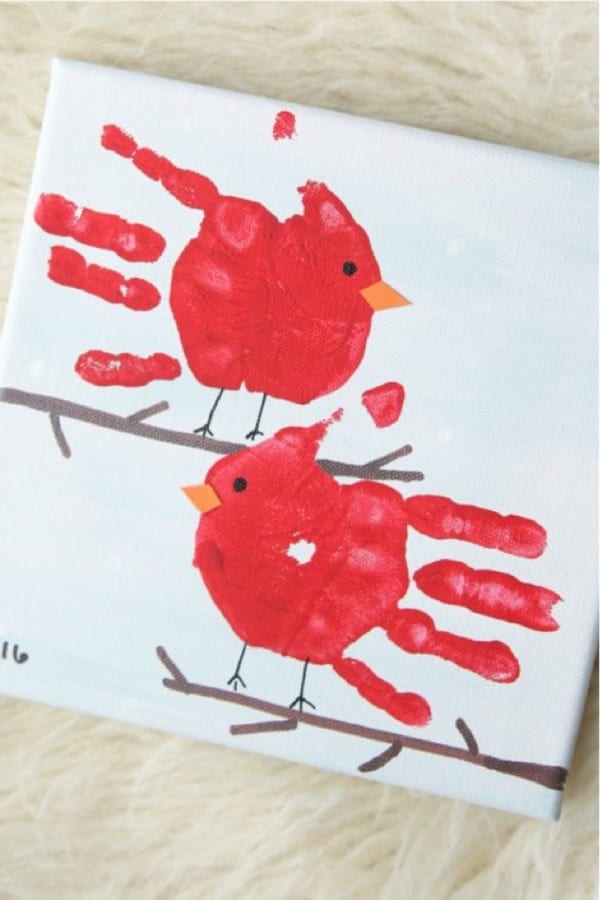 kids art tutorial with red painted handprints