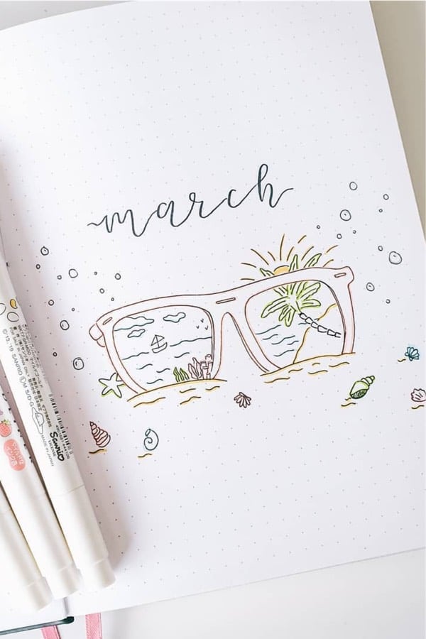 march bujo cover with beach doodles